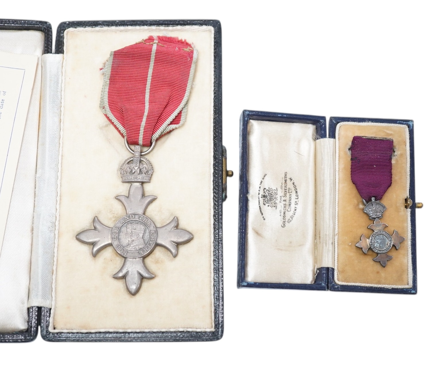 A cased George V military MBE containing leaflet with instructions as to wearing Insignia, together with the separately cased miniature. Condition - fair to good